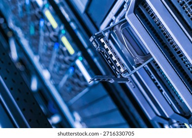 Close-up view of a server rack showcasing a hard drive in a modern data center. High-tech design reflects the innovation in storage technology.
