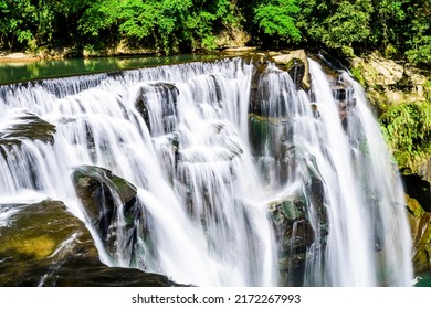 Close-up view of the Shifen Waterfall in New Taipei, Taiwan.