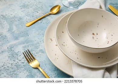 Closeup View Of Simple Dinnerware On Blue Table