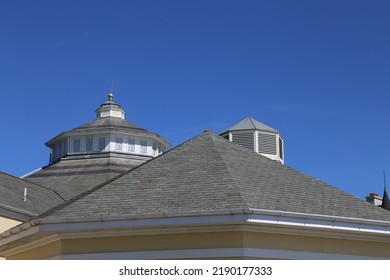 A Closeup View Of A Slate Tiled Roof With Octagonal Roof Lantern Centre Piece.