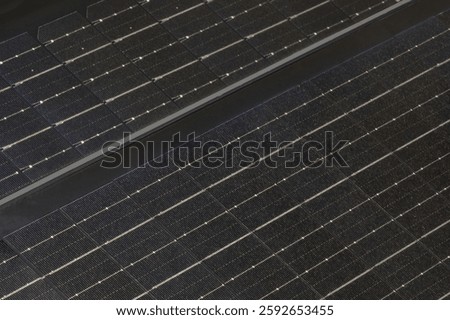 Close-up view of solarcell texture highlighting the detailed design and efficiency of solar energy panels in use.