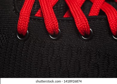 Closeup View Of Sport Shoe. Red Shoelaces Closeup.