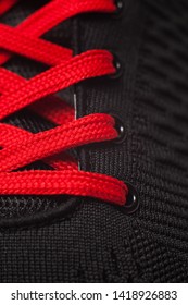 Closeup View Of Sport Shoe. Red Shoelaces Closeup.