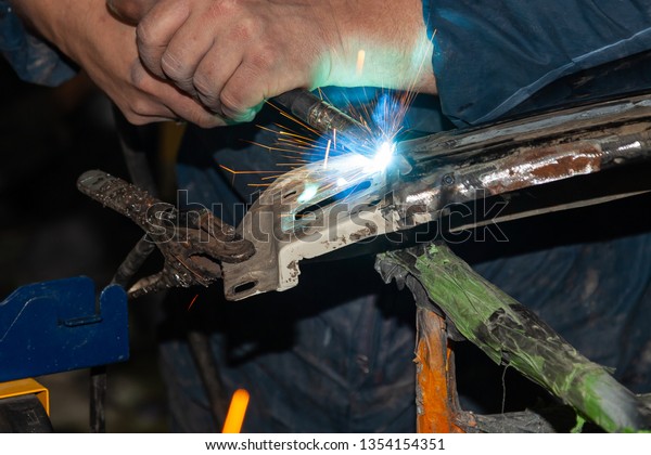 Closeup View Strong Man Welder Blue Royalty Free Stock Image