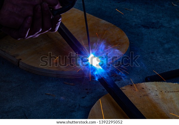 Closeup View Strong Man Welder Blue Technology Industrial Stock