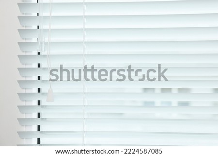 Closeup view of stylish horizontal window blinds