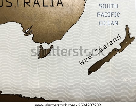 Close-up view of a stylized map with focus on New Zealand and surroundings