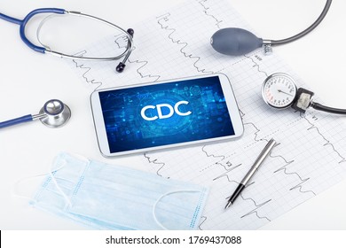 Close-up view of a tablet pc with CDC abbreviation, medical concept
