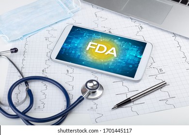 Close-up view of a tablet pc with FDA abbreviation, medical concept