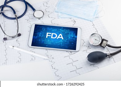 Close-up view of a tablet pc with FDA abbreviation, medical concept