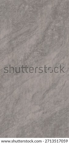 Close-up view of a textured gray surface with subtle natural patterns and variations in tone