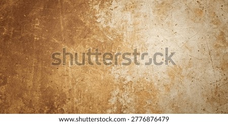 Close-up view of a textured sandy surface with subtle light reflections
