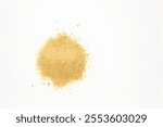 Closeup view from top down on a heap of nutritional yeast flakes and powder on white background with copyspace