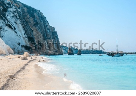 Close-up View of the Towering White Cliffs and Turquoise Water at White Rocks Beach, Kefalonia, Greece