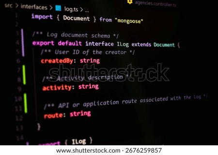 Close-up view of TypeScript Log interface code using Mongoose for MongoDB schema, showing export default interface, string types, and application API structure in software development project.
