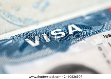 Close-up view of a us visa stamped on a passport page, travel and immigration concept