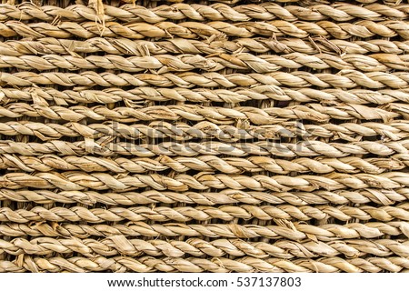 closeup view of variant type of ratan basket with horizontal lines