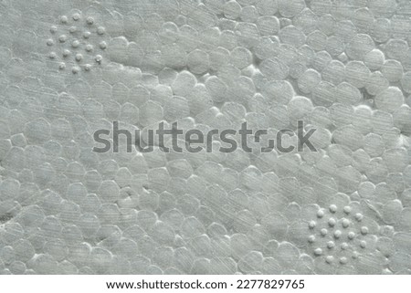 Close-up view of white expanded polystyrene (PS) plastic foam. Used for food or electronic packaging, or insulation of buildings.