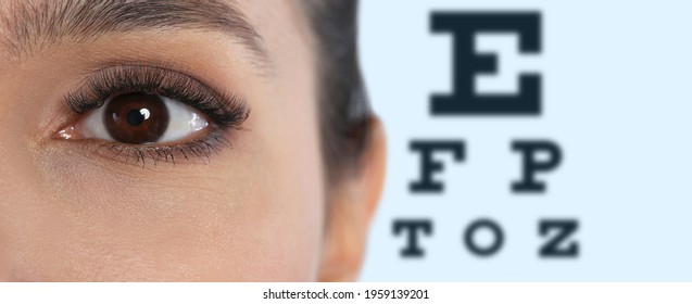 Closeup View Of Woman And Blurred Eye Chart On Background, Banner Design. Visiting Ophthalmologist 