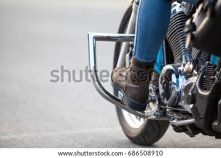 Similar – Image, Stock Photo Couple sitting over motorcycle ready to go