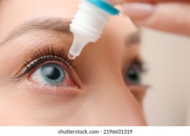 Closeup View Of Woman Using Eye Drops