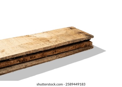 Closeup view of wood plank stack isolated over white background. Natural wooden texture