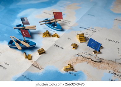 Close-up view of a world map featuring small boats with USA, Turkey, and China flags, alongside an EU flag and scattered gold bars, depicting global finance and geopolitical wealth distribution