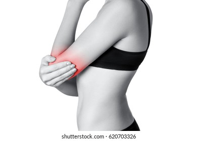 Closeup view of a young woman with elbow pain.  isolated on white background. Black and white photo with red dot. - Shutterstock ID 620703326