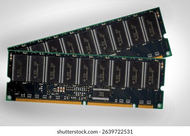 Close-up of vintage computer RAM memory modules isolated on white background, used in desktop hardware for data processing and system performance