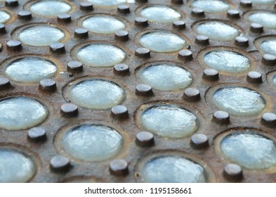 Closeup Of Vintage Vault Lights At The Base Of The Puck Building On Lafayette Street In Soho, NYC