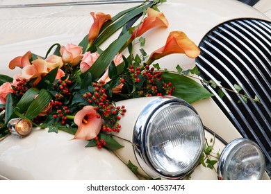 Close-up of Vintage Wedding Car Decorated with Flowers