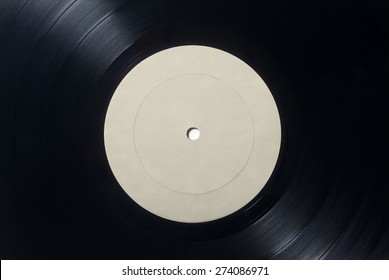 Closeup of Vinyl Long Play Record with Label with Copy Space.