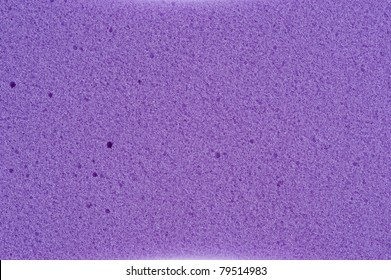 Closeup of violet cleaning sponge texture