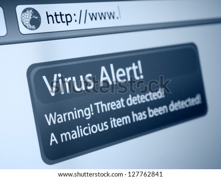 Closeup of Virus Alert Sign in Internet Browser on LCD Screen