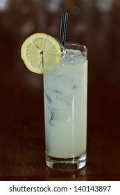 Closeup Of A Vodka And Lemonade Served In A Busy Out Of Focus Bar