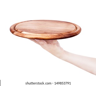 Closeup of a waiter hand holding up a silver serving tray over a white background.