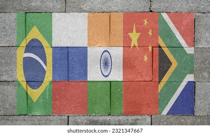 A closeup of a wall with BRICS flags