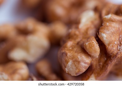 Close-up walnut on a white background. Macro shot.