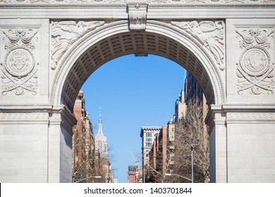 Close-up of the Washington Square Park Arch in midtown Manhattan under blue skies in New York