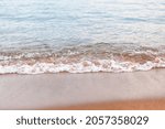 Close-up of water ripples and sandy beach in summer at Skaha Lake, Okanagan Valley