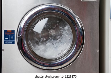 Closeup Of Water Spinning In Washing Machine