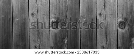 Close-up of Weathered grey Wood Texture with crack and Knot. Wooden texture background,  gray plank with tree knotted pattern. Grey timber texture background. Wood surface, knot. top view