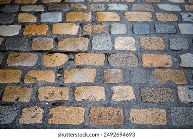 closeup of wet cobblestone in a medieval village - Powered by Shutterstock