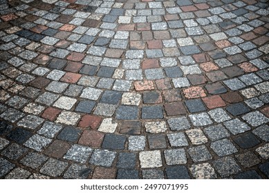 closeup of wet cobblestone in a medieval village - Powered by Shutterstock