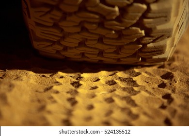 close-up of a wheel on the sand