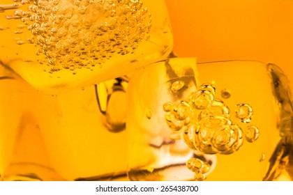 Close-up Of Whiskey In Glass With Ice Used For Background, Whisy Texture