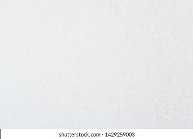 Closeup white blank linen fabric texture background.