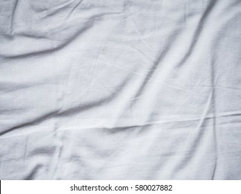 Closeup of white fabric fold background