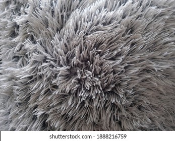 Closeup Of A White, Fuzzy Pillow