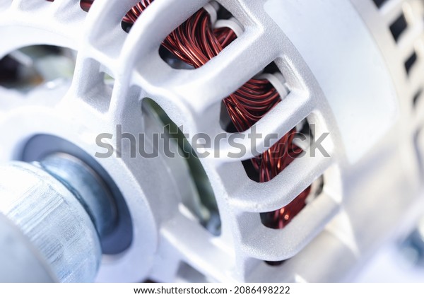 Closeup of white\
generator car repair\
parts